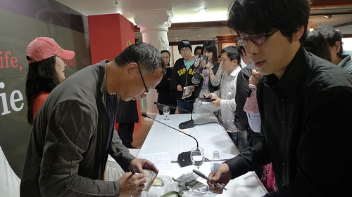 Johnnie To signing autographs