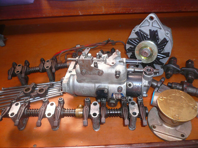 Spare motor parts - Rods, 2 Rocker assemblies and 2 rocker arms, fuel injection pump, water pump, 4 injectors (cleaned and checked in Aug 08), and the spare alternator