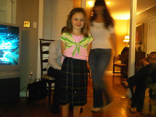 Mia tries on her new Scottish kilt