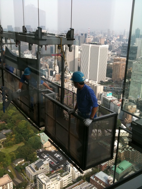 Cleaning windows at Ritz Carlton Tokyo