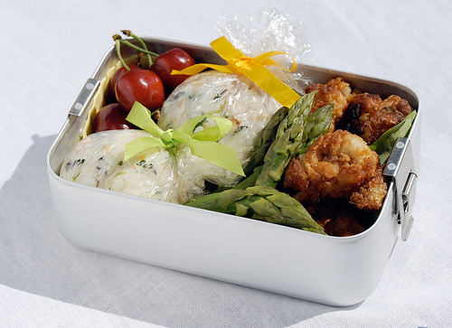 Chicken karaage lollipops and gift-wrapped onigiri bento