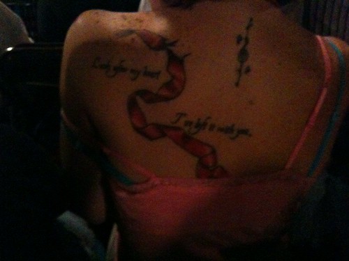 Woman in front of me let take a photo of her Twilight tattoo