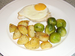 Turkey Breast Steak with Fried Egg, Sage and Garlic Roast Potatoes and Brussels Sprouts