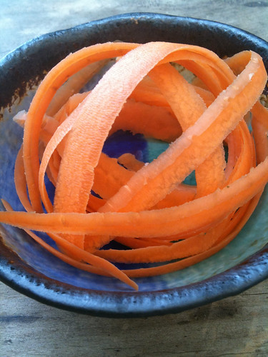 Carrot peel twirled into still life