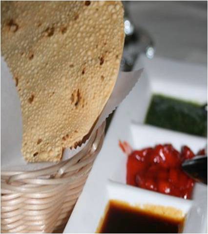 Nirvana’s Delicious Papadum is served with an assortment of three delicious condiments.