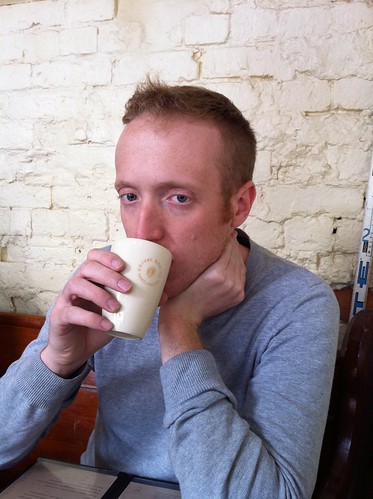 an unusual but gorgeous ceramic latte glass as modelled by a man of the same calibre