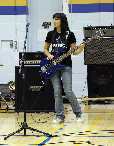 Jessie Penner plays the bass in Lucid at the DHS Spread the Net talent show.