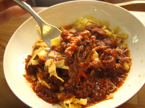 Braised pork in red wine and tomato sauce
