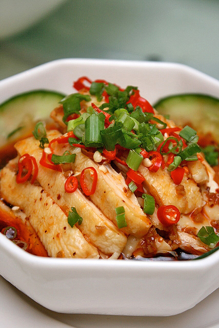 Boiled sliced chicken and cucumber with homemade chili oil