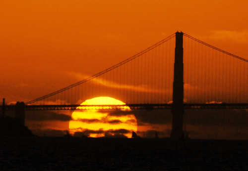 golden gate bridge sunset. view large. Sunset behind the
