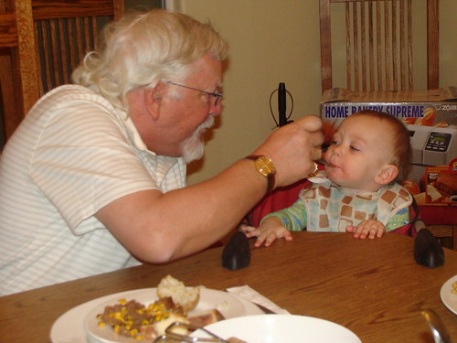 Grandpa Bob feeding Silas