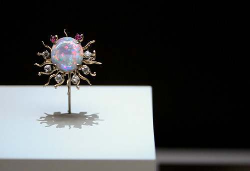 black opal, diamonds and rubies set in gold brooch