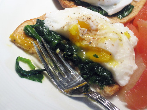 Poached Eggs Over Sauteed Garlic Spinach