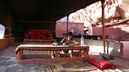 catching up on my travel journal in a bedouin tent, wadi rum