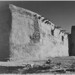 Side wall and tower with cross, "Church, Acoma Pueblo. [National Historic Landmark, New Mexico]" [Misicn de San Estevan del Rey, Acoma]
