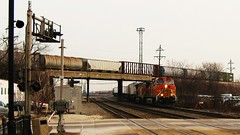 BNSF Railway intermodal switching movement passing underneath a westbound Canadian National freight train. Berwyn Illinois. Febuary 2010.