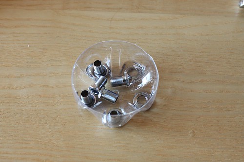 Tuning machine's mounting nuts and washers in parts cleaner