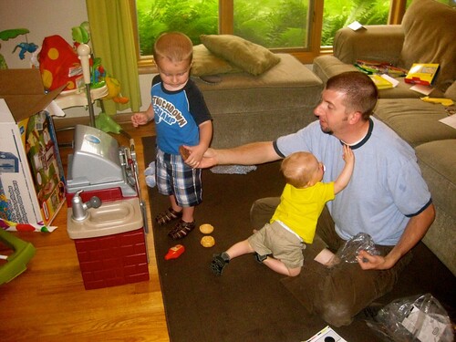 Daddy and Boys Playing