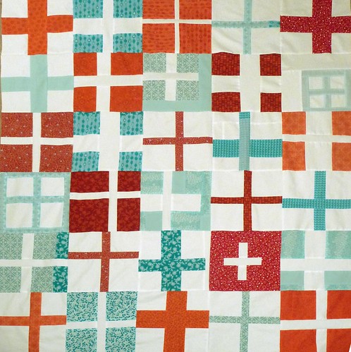 red and aqua cross quilt