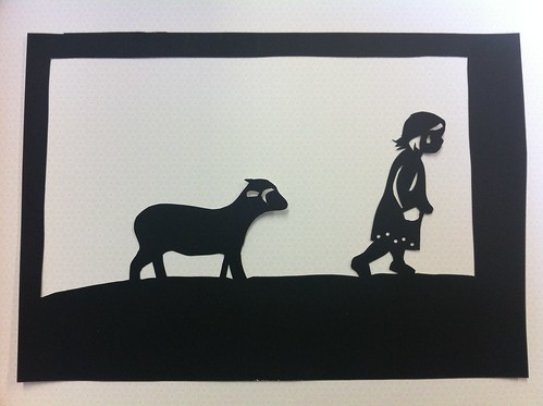 Silhouette of Lucy and lamb