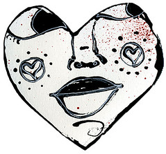 heart shaped - her red spattered cheek