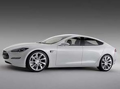 Tesla-seals-465-million-loan-to-mass-produce-EV_295x220