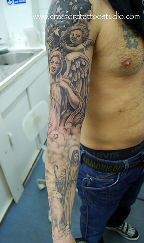 Religious sleeve Tattoo Tattooed by Ray