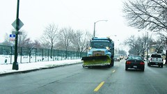 Northbound City of Chicago Department of Streets and Sanitation snowplow truck on Harlem Avenue. Chicago Illinois. December 2009.