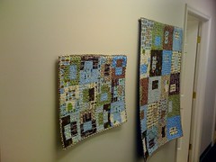quilts hung on the walls in Mr. U's office