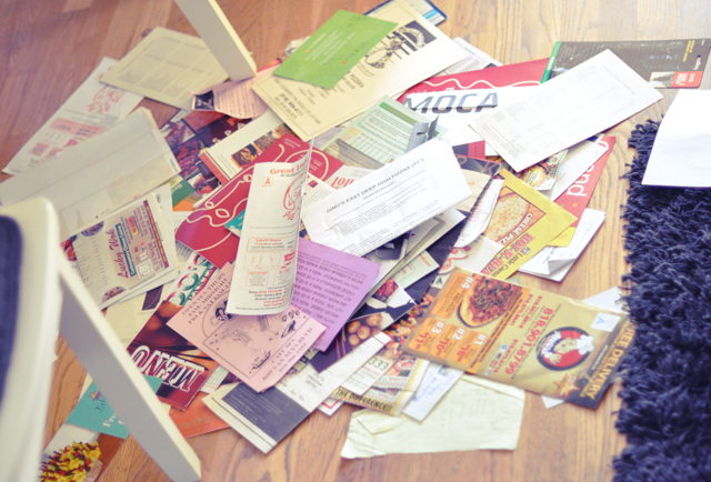 take out menus on the kitchen  floor + trash