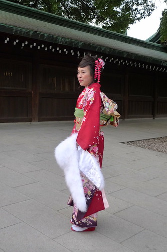 Chinese girl in striking red kimono