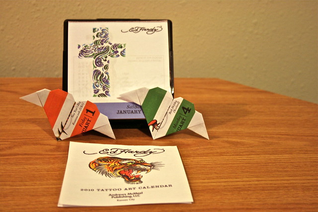 I'm using the 2010 Ed Hardy Tattoo Art Calendar to craft origami.