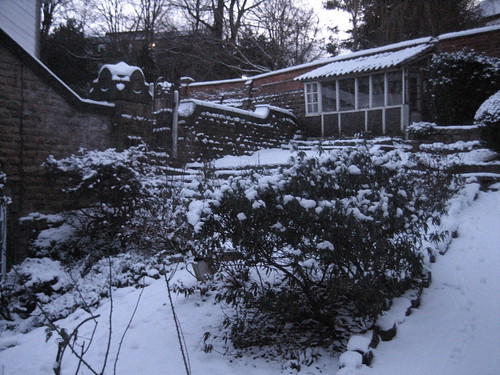 coachhouse in snow - garden