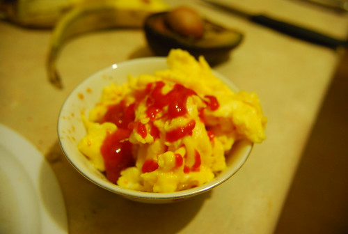 Scrambled eggs and Rooster sauce