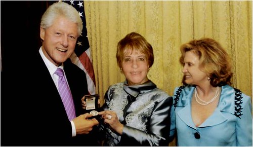 Loula with President Bill Clinton and Congressmember Carolyn B, Maloney.