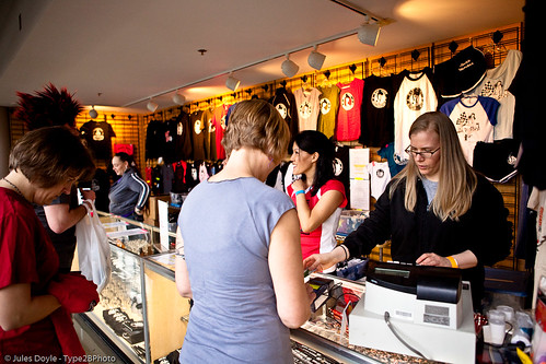 The merch booth in action