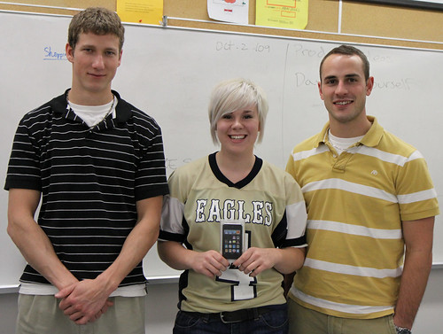 Mike McCaffery (l) and Mike Greaves (r) present Krista Bannon with an iPod Touch for 1st place in the Business Plan Competition.