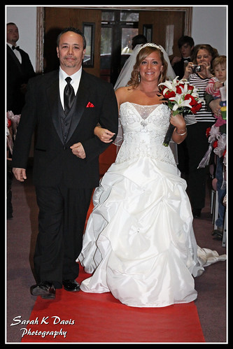 Sandra & her father walking down the aisle