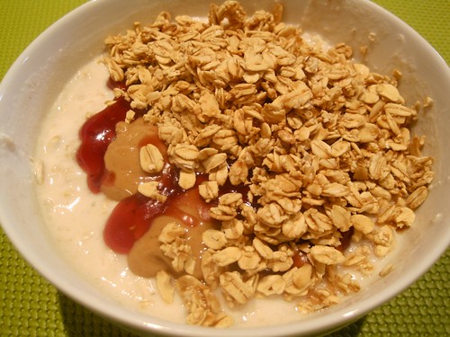 Overnight Oats with Peanut Butter and Raspberry Preserves and Topped with Granola