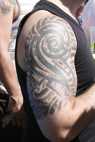 tribal tattoos on shoulder and chest. shoulder and chest tattoo
