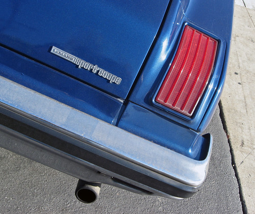 1975 Pontiac Le Mans Sport Coupe badge and taillight by Ate Up With Motor