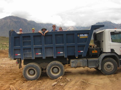 hitching a ride in a dumptruck