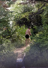 This person was photographed walking nude down the trail near the Geist dam. Note the bench in the foreground donated by the Geist Harbours Property Owners Association.