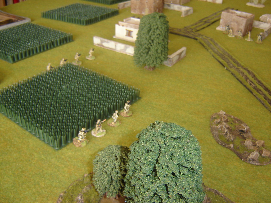2nd Section enters village from flank