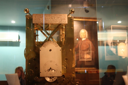 This was one of Harrisons earlier clocks, with his portrait in the background. 