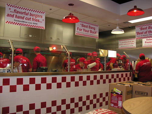 A lot more than five guys were prepping burgers and fries in Tempe