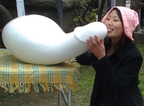 A shopgirl licking an object