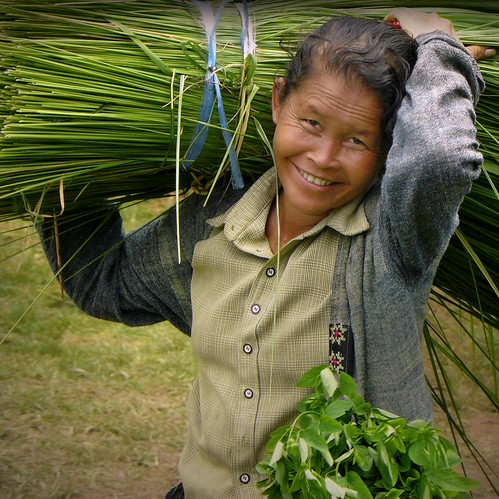 Friendly Lao woman at work by