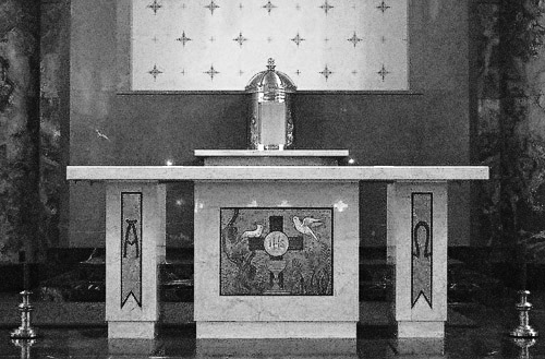 Saint Gabriel the Archangel Roman Catholic Church, in Saint Louis, Missouri, USA - Good Friday - Tabernacle is empty, and altar is stripped