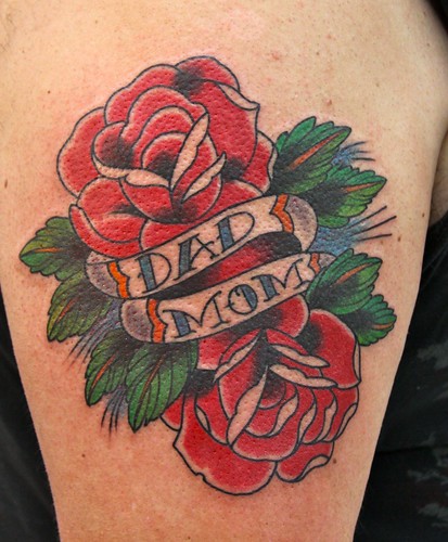 mom and dad tattoo. two roses and Mom and Dad